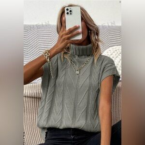 Grey turtleneck sweater vest